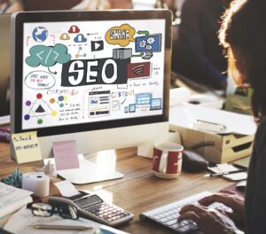 SEO Agency working on computer desk