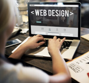 Web designer on laptop